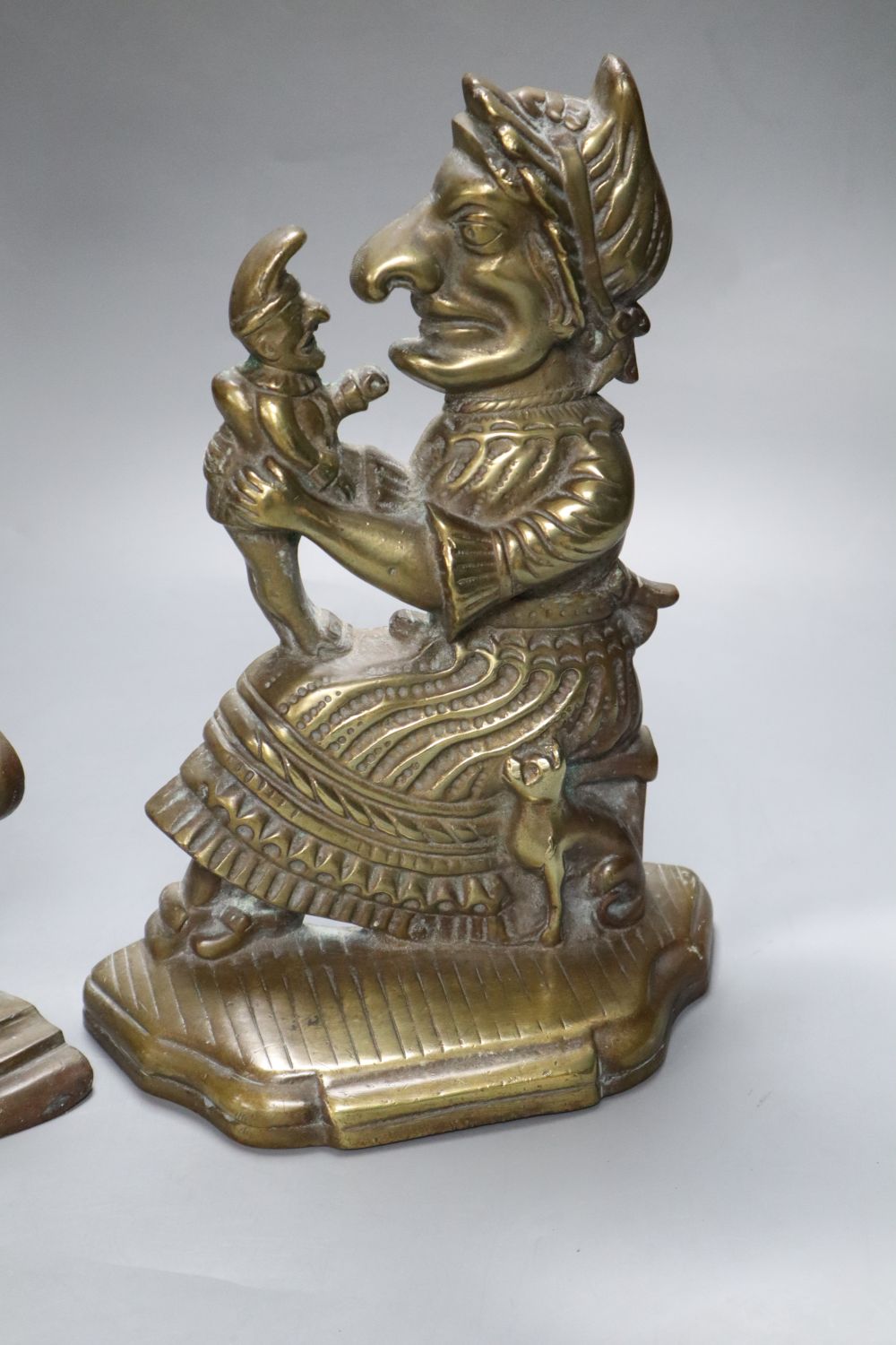 A pair of Victorian cast brass Punch and Judy door-stops, Punch 30cm